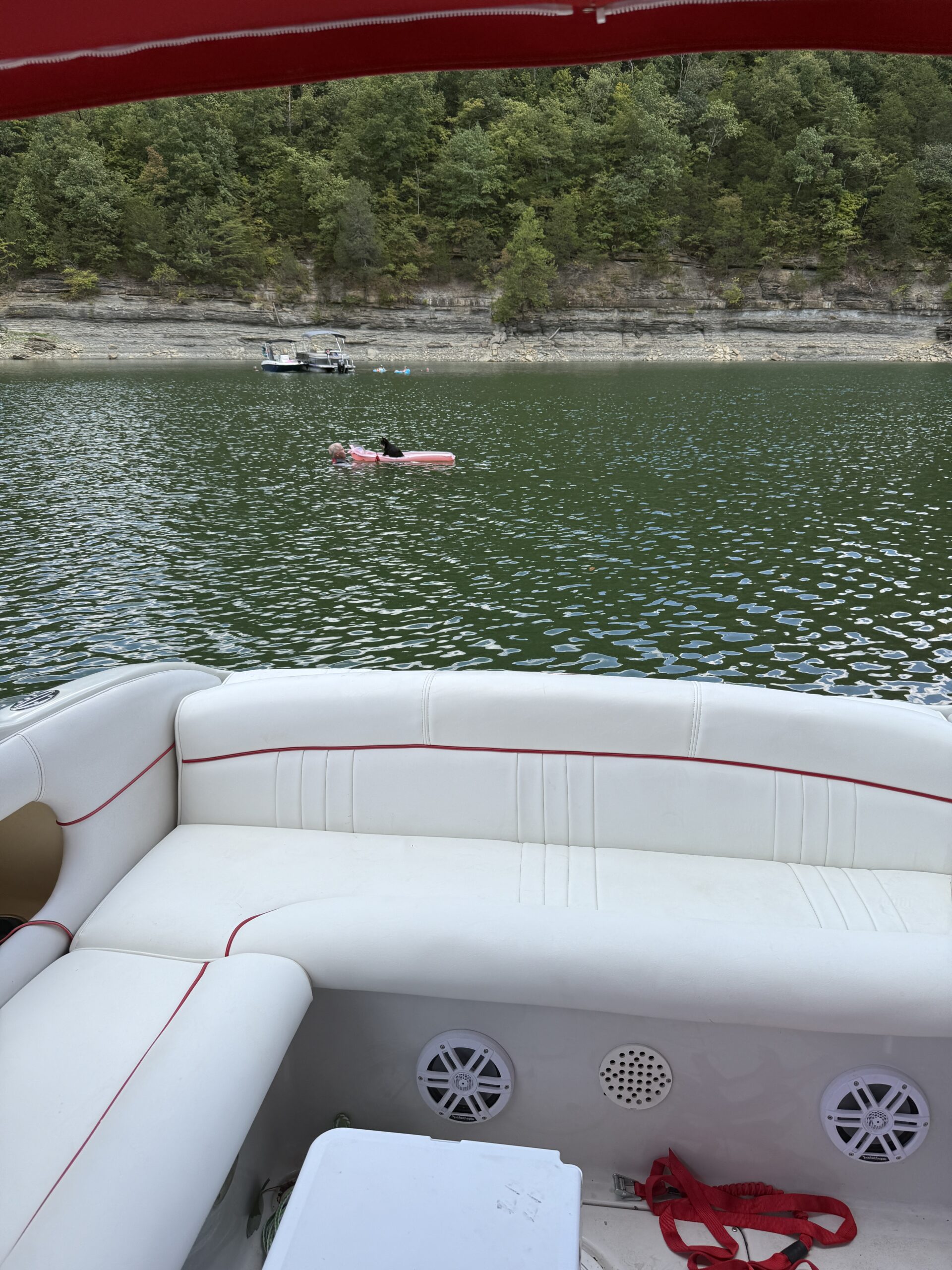 Durable custom-fitted sail cover for a sailboat